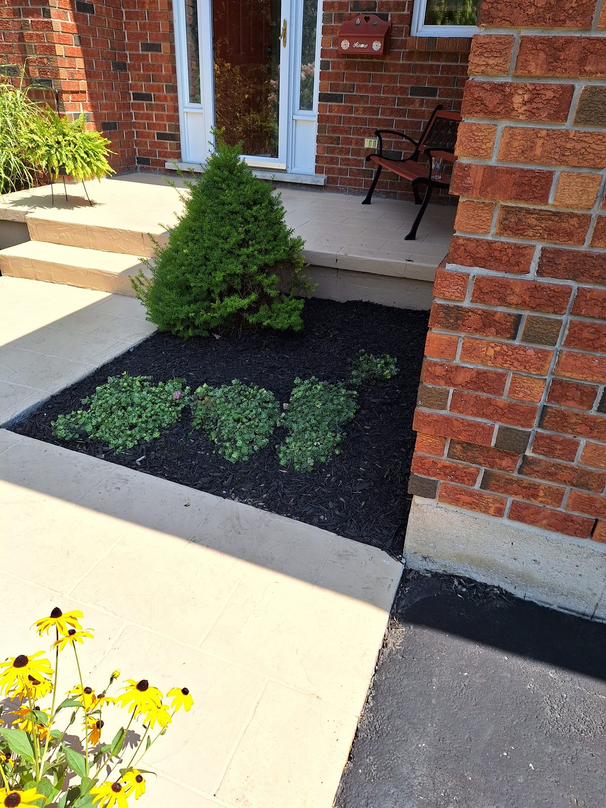 Fresh mulch garden bed — Steadfast Home Services